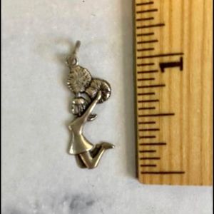 Vintage sterling silver cheerleader charm.